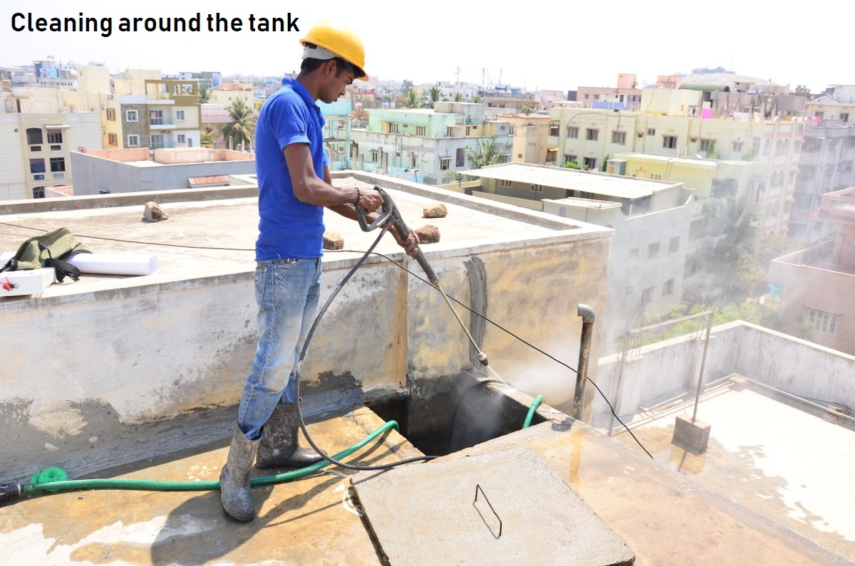 Cleaning the area around the tank