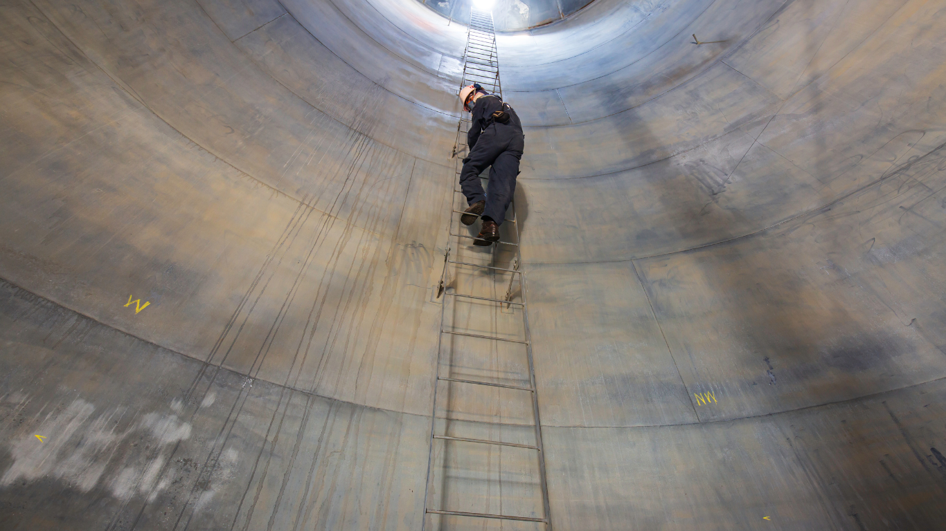 Descending into tank